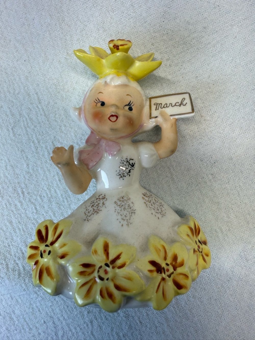 VINTAGE ceramic figurine is a Napco
"Flower Girl of the Month" March Daffodils
